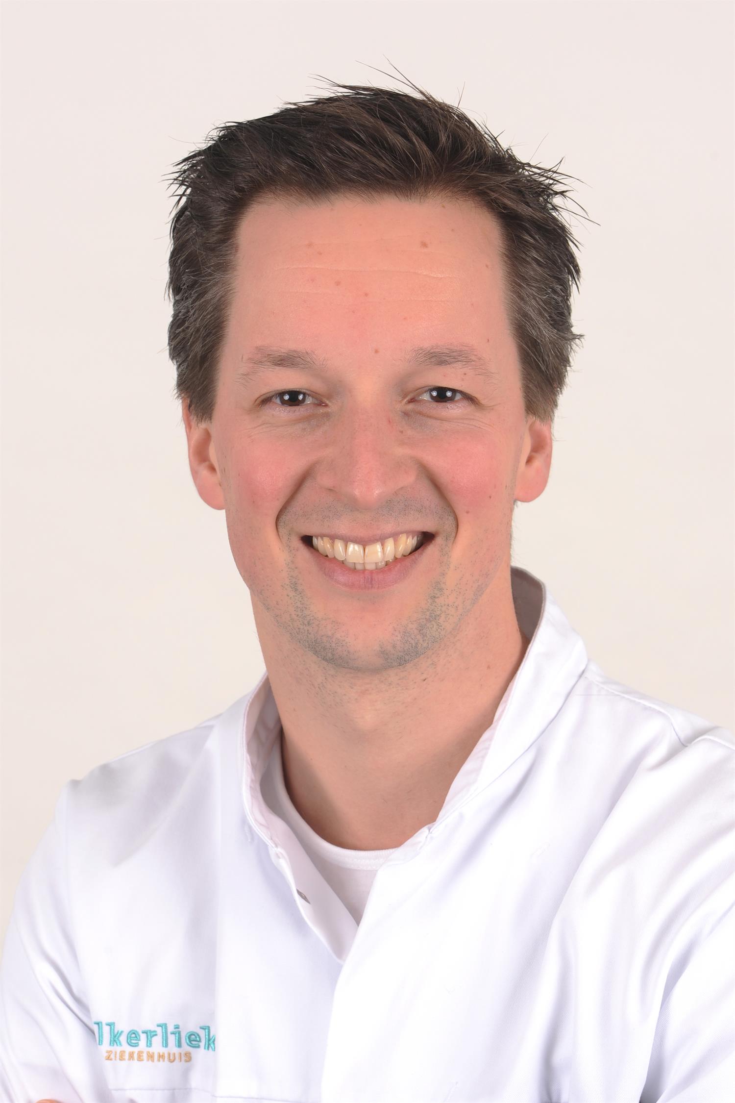 de heer dr. J.P.J. Dings
